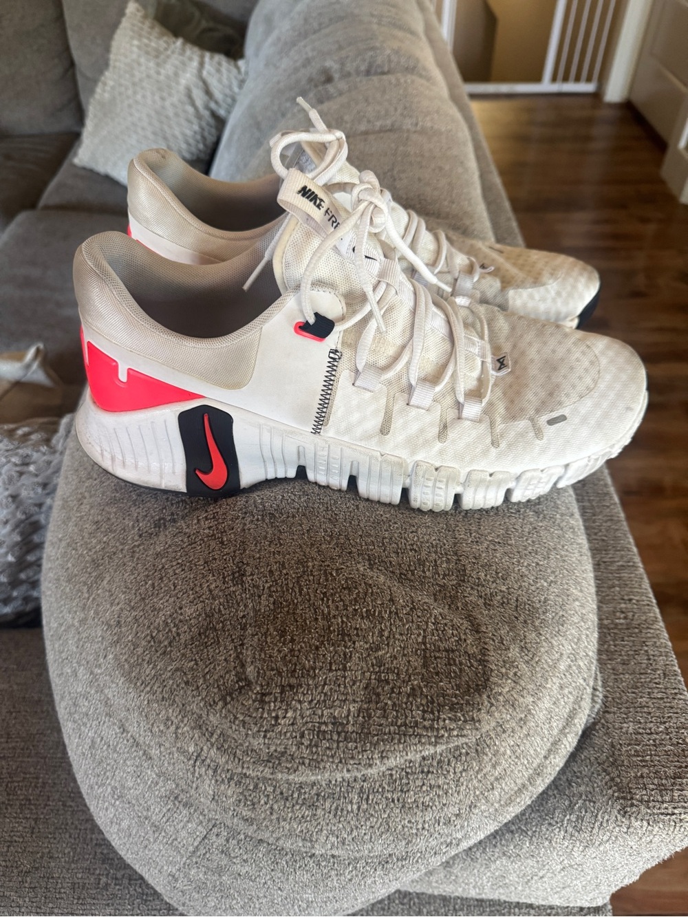 Nike Men’s White Athletic Shoes with Red and Black Accents